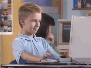 Gif animé vintage d'un enfant qui lève le pouce devant son ordinateur